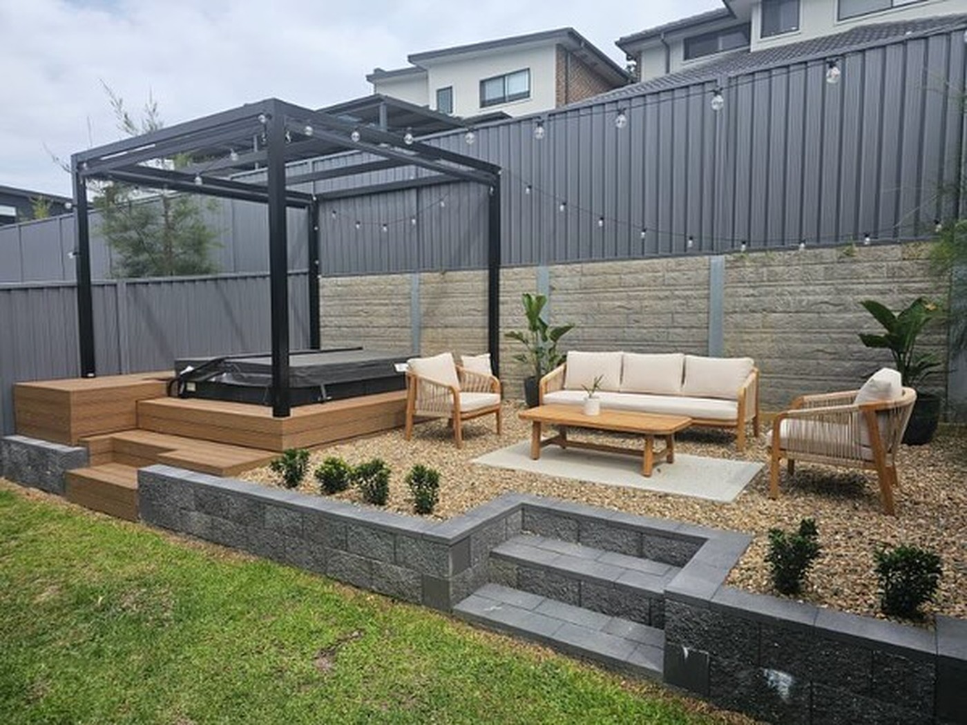 Close-up of a hardwood deck corner with tight mitred joins and stainless fixings
